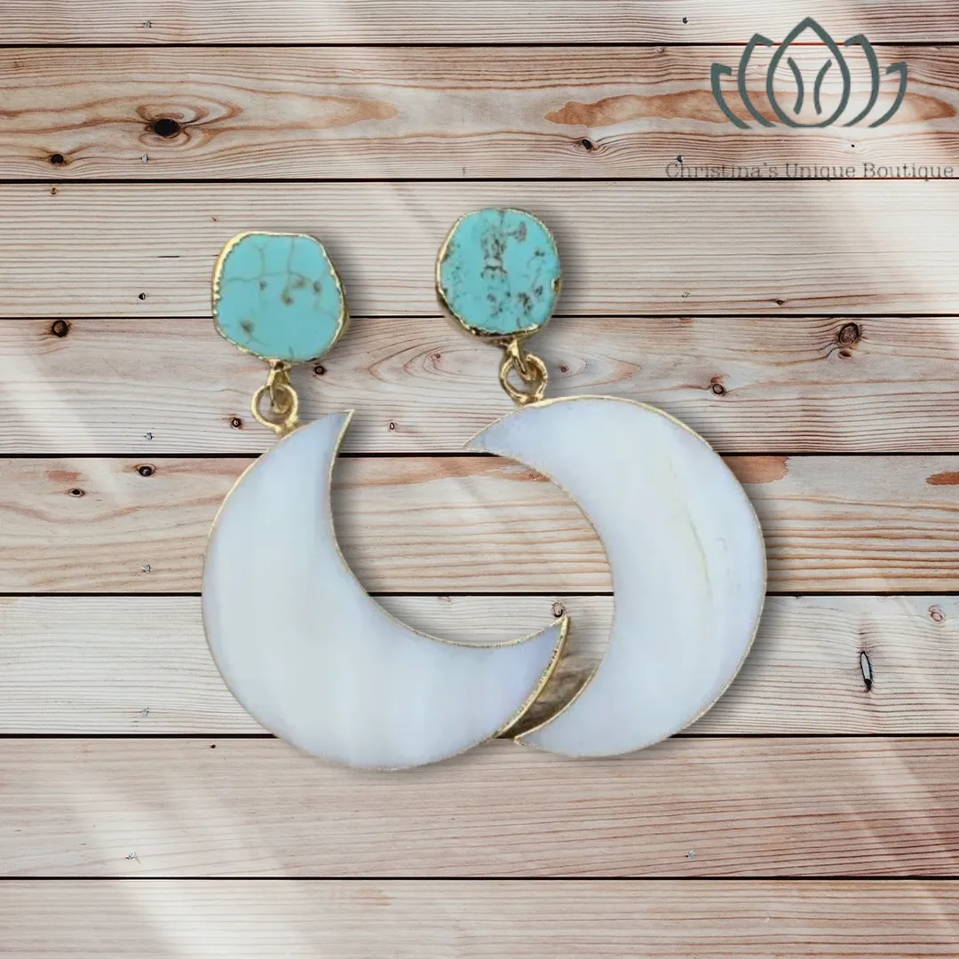Gorgeous mother of Pearl crescent moon earrings dipped in gold, with raw turquoise.
