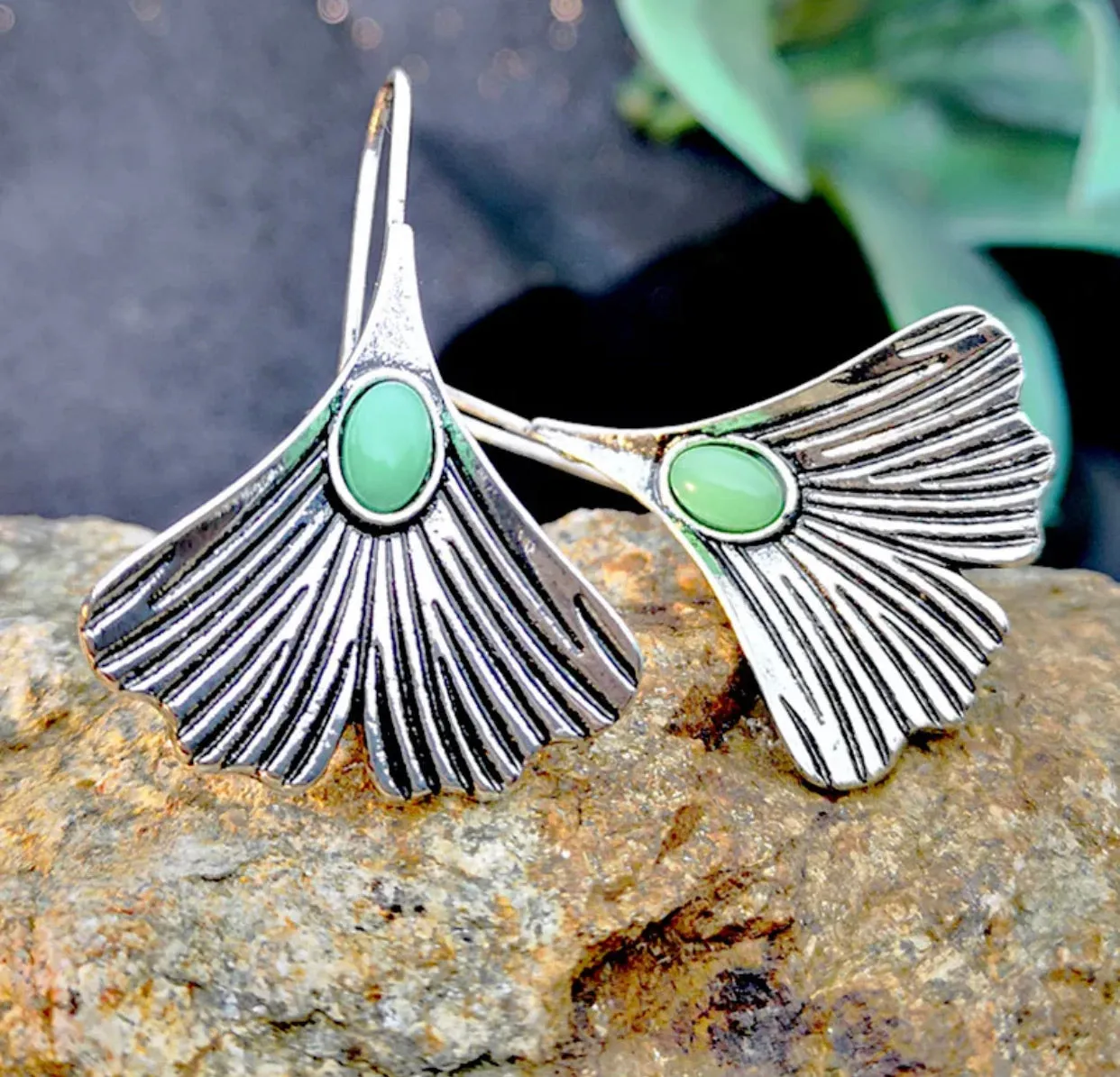 Handmade unique vintage style green stone inlaid dangle earrings.