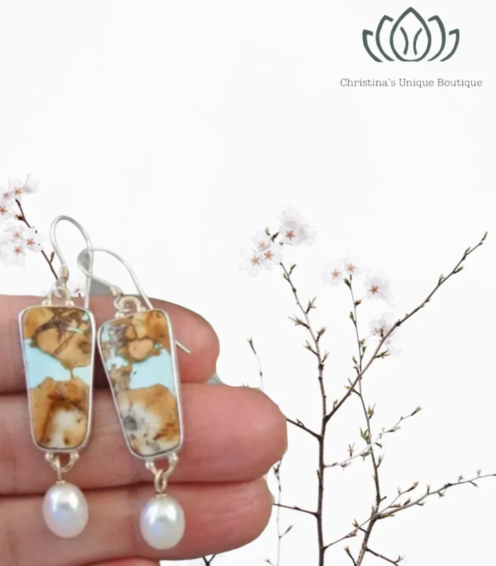 Uniquely designed Pearl pendant dangle earrings.